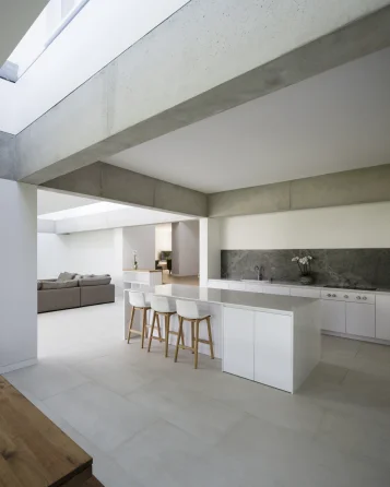 10_A_MC_7475_L_PRINT_kitchen looking across and up to existing house on upper level.jpg